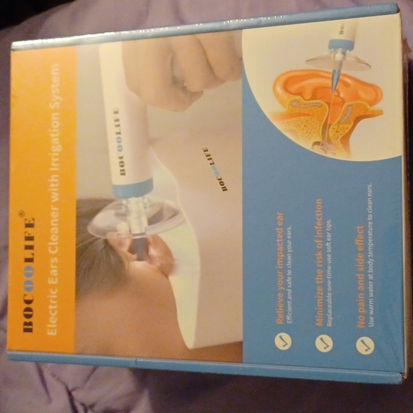 Electric ear cleaner with irrigation system - Picture 1 of 4